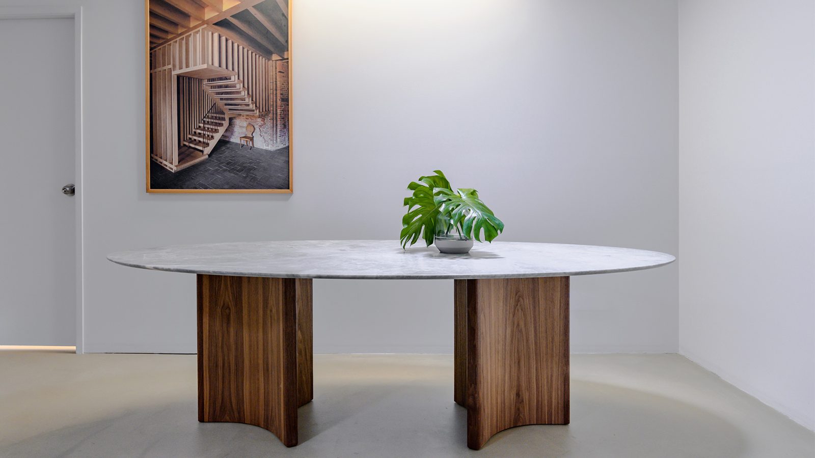 The table built: marble top on walnut plinths